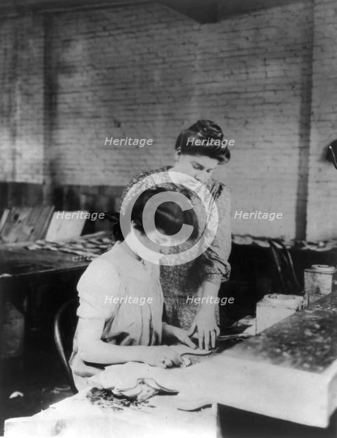 Miss Bessie Prince and Miss Ella Parrott working in a shoe factory, Lynn, Mass., (1895?). Creator: Frances Benjamin Johnston.