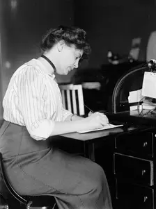 Miss Carolyn B. Sheldon at Desk, 1914. Creator: Harris & Ewing