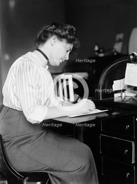 Miss Carolyn B. Sheldon at Desk, 1914. Creator: Harris & Ewing.