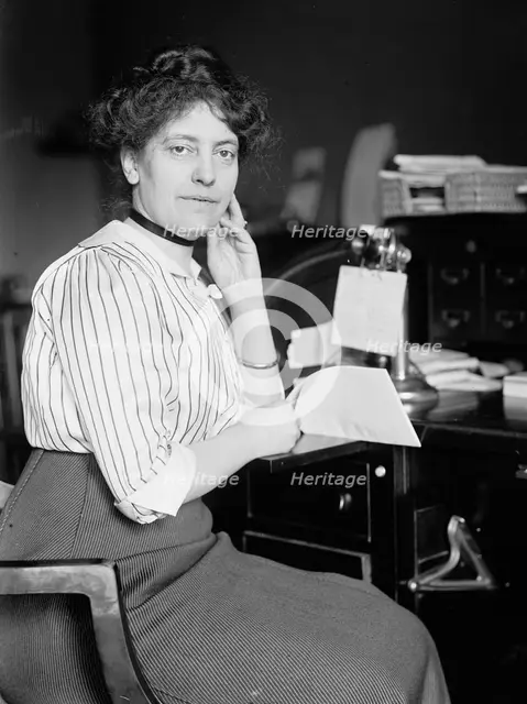 Miss Carolyn B. Sheldon at Desk, 1914. Creator: Harris & Ewing.