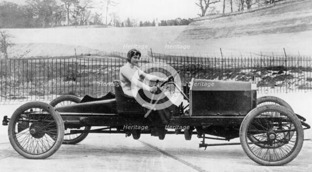 Miss Dorothy Levitt, in a 26hp Napier, Brooklands, 1908. Artist: Unknown
