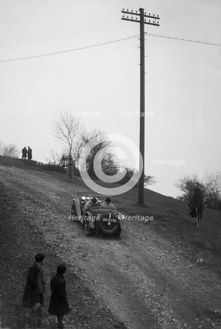 Miss EV Watson's MG J3 climbing Nailsworth Ladder, Sunbac Colmore Trial, Gloucestershire, 1934. Artist: Bill Brunell.