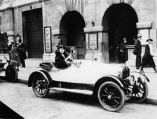 Miss Evelyn Laye sitting in a parked car, (1920s?)