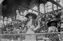 Miss Genevieve Ebbets, youngest daughter of Charley Ebbets, throws first ball at opening..., 1913. Creator: Bain News Service