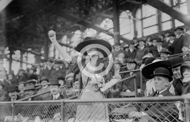 Miss Genevieve Ebbets, youngest daughter of Charley Ebbets, throws first ball at opening..., 1913. Creator: Bain News Service.