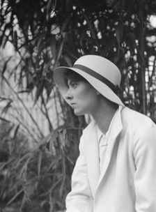 Miss Harriet Taylor, seated outdoors, 1932. Creator: Arnold Genthe