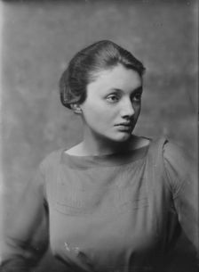 Miss Katharine Cornell, with dog, portrait photograph, 1917 Nov. 20. Creator: Arnold Genthe