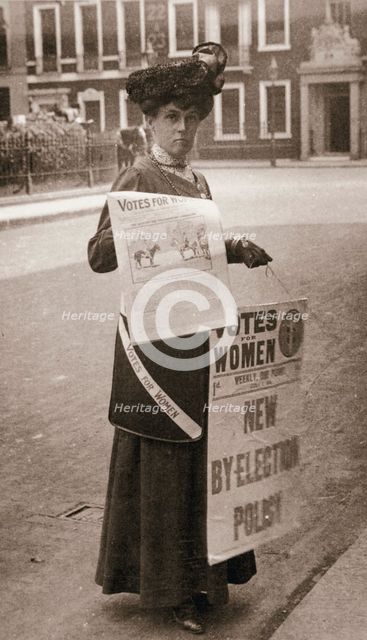 Miss Kelly, a suffragette, selling "Votes for Women", July 1911. Creator: Unknown.