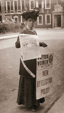 Miss Kelly, a suffragette, selling "Votes for Women", July 1911. Creator: Unknown