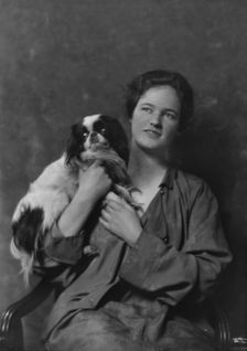 Miss Lisa Stillman, with dog, portrait photograph, 1918 Apr. 5. Creator: Arnold Genthe