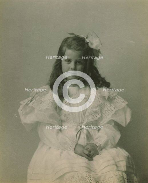 Miss Martha Cameron, three-quarter length portrait, seated, facing front, between 1890 and 1910. Creator: Frances Benjamin Johnston.