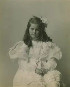 Miss Martha Cameron, three-quarter length portrait, seated, facing front, between 1890 and 1910. Creator: Frances Benjamin Johnston