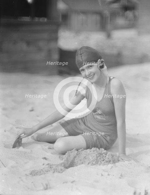Miss Marguerite Churchill, at the beach, 1923 July. Creator: Arnold Genthe.