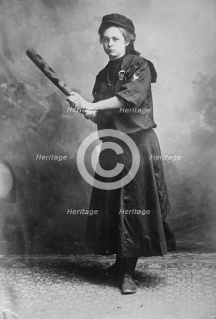 Miss Myrtle Rowe holding a baseball bat, 1910. Creator: Bain News Service.