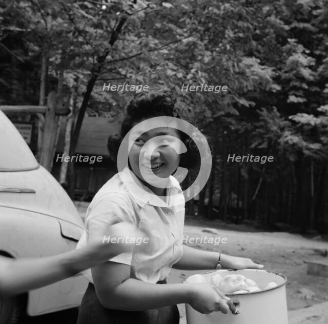 Miss Sumi Yumaguchi, Japanese dietican, Camp Ellen Marvin, Arden, New York, 1943. Creator: Gordon Parks.