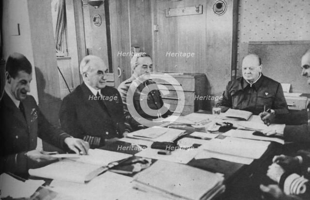 'Mr Churchill at a conference on board ship', 1943-1944.  Artist: Unknown.