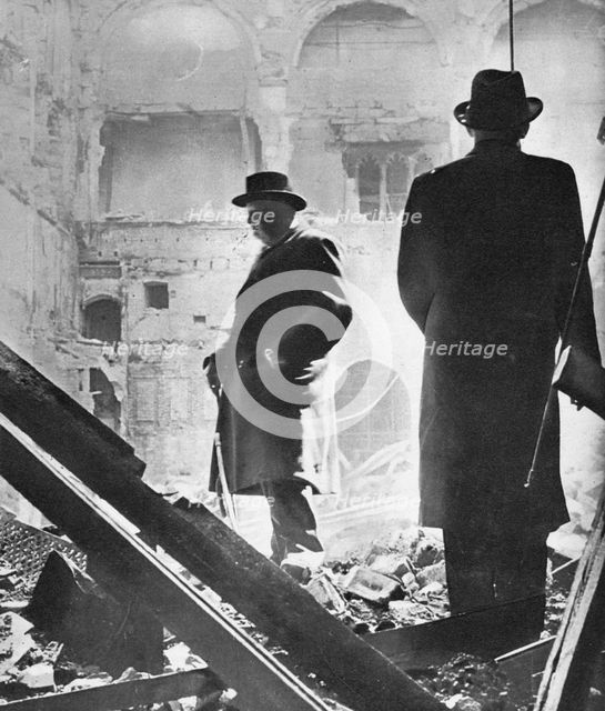 'Mr. Churchill contemplates the ruins of the House of Commons, bombed in May 1941', 1941 Artist: Unknown.