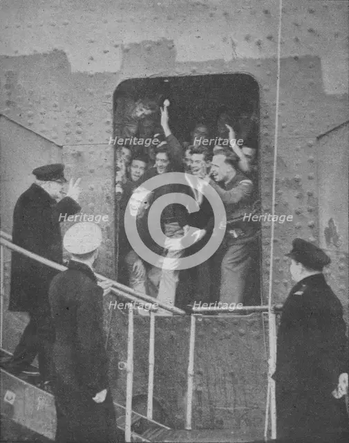 'Mr. Churchill gives the V-Sign to cheering members of the ship's crew', 1943-1944. Artist: Unknown.