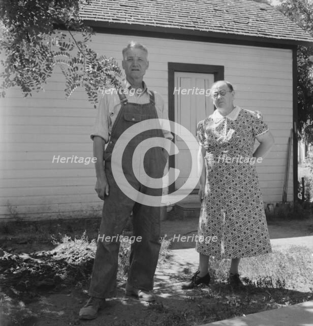 Mr. and Mrs. Chris Ament, dry land wheat farmers who survived..., south of Quincy, Washington, 1939. Creator: Dorothea Lange.
