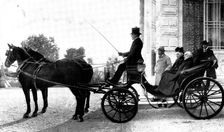 Mr. and Mrs. Gladstone, about to start for their daily drive from the Chateau Thorenc, Cannes, 1898. Creator: Numa Blanc