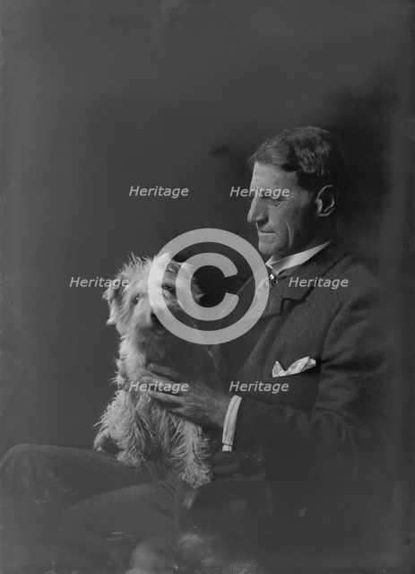 Mr. Arthur Young, with dog, portrait photograph, 1918 Oct. 1. Creator: Arnold Genthe.
