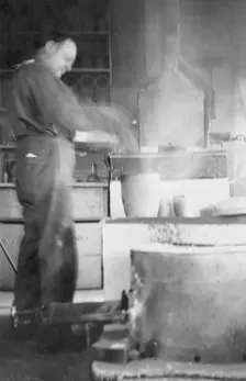 Mr. Kah smelting gold at the Assay Office, between c1900 and 1916. Creator: Unknown