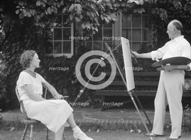 Mr. Hamilton King painting Mrs. Hamilton's portrait outdoors, between 1934 and 1942. Creator: Arnold Genthe.