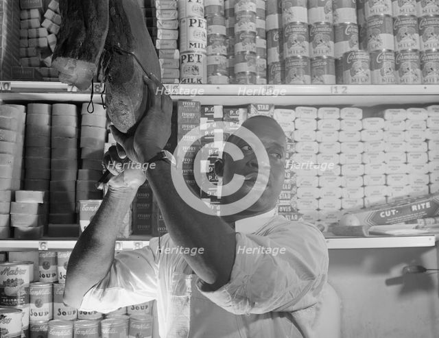 Mr. J. Benjamin, a store owner, Washington, D.C., 1942. Creator: Gordon Parks.