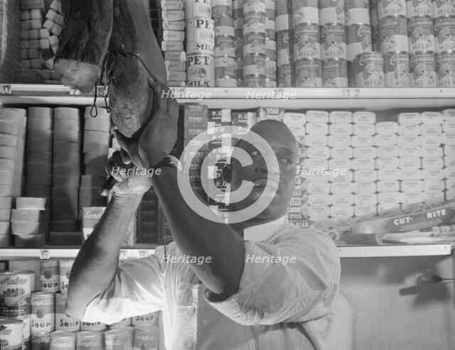 Mr. J. Benjamin, a store owner, Washington, D.C., 1942. Creator: Gordon Parks.