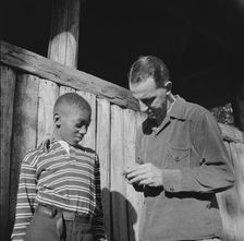 Mr. Lewis Traver, the director, with camper at Camp Nathan Hale, Southfields, New York, 1943 Creator: Gordon Parks