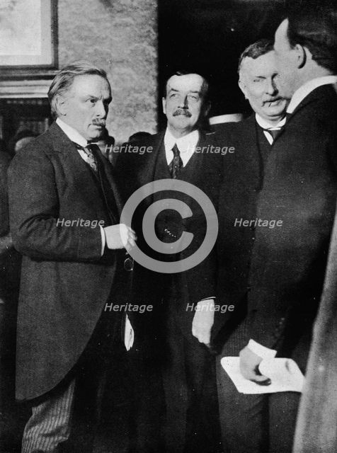 'Mr. Lloyd George, Mr. Runciman, and Mr. Henderson at the Park Hotel, Cardiff, after their interview Artist: Unknown.