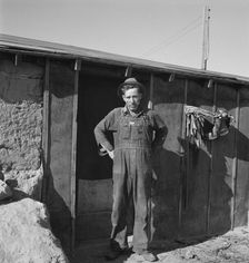 Mr. Roberts in front of his Owyhee project home, Malheur County, Oregon, 1939. Creator: Dorothea Lange