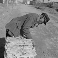 Mr. Venus Alsobrook, official salvage collector for the government, Washington, D.C., 1942. Creator: Gordon Parks
