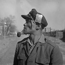 Mr. Venus Alsobrook official salvage collector for the government, Washington, D.C., 1942. Creator: Gordon Parks