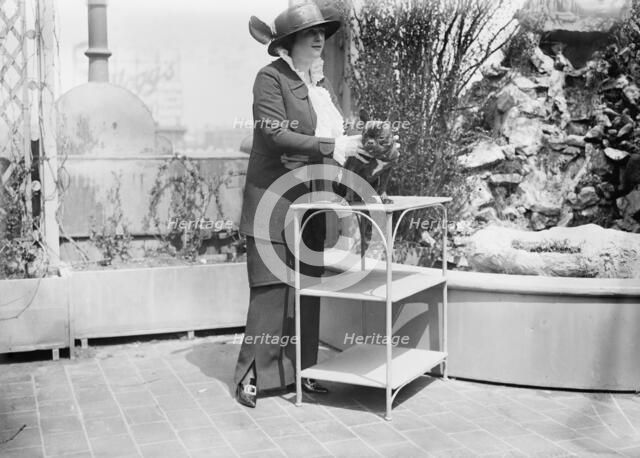 Mrs. Malcolm Strauss and pet, between c1910 and c1915. Creator: Bain News Service.