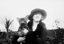 Mrs. Malcolm Strauss & "Beaux Attos" [i.e., Athos], between c1910 and c1915. Creator: Bain News Service