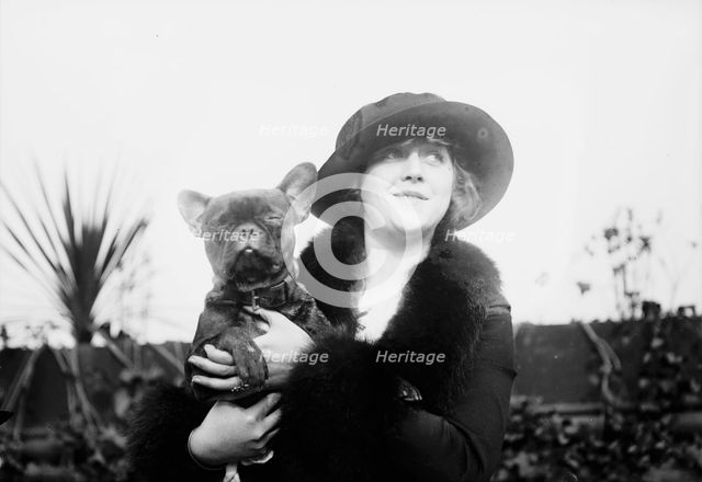 Mrs. Malcolm Strauss & "Beaux Attos" [i.e., Athos], between c1910 and c1915. Creator: Bain News Service.