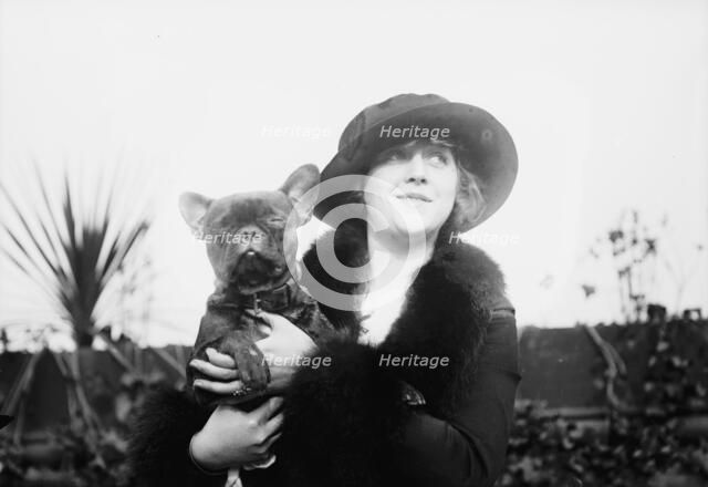 Mrs. Malcolm Strauss & "Beaux Attos" [i.e., Athos], between c1910 and c1915. Creator: Bain News Service.