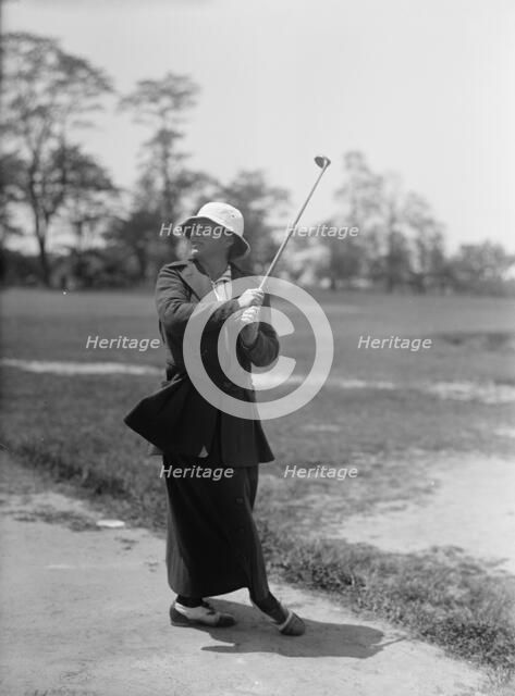 Mrs. Mann Playing Golf, 1916. Creator: Harris & Ewing.