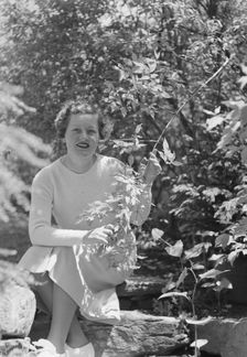 Mrs. Mary Benson seated outdoors, between 1933 and 1942. Creator: Arnold Genthe
