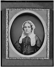 Mrs. Miller, head-and-shoulders portrait of a woman, facing front, between 1840 and 1860. Creator: Unknown