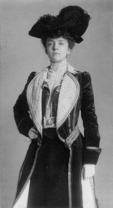 Mrs. Alice Roosevelt Longworth, three-quarter length portrait, standing with..., c1902. Creator: Frances Benjamin Johnston