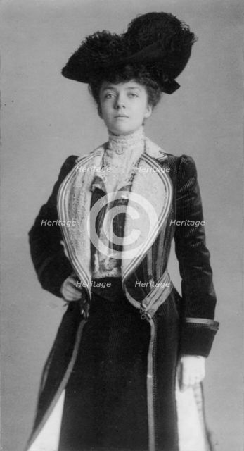 Mrs. Alice Roosevelt Longworth, three-quarter length portrait, standing with..., c1902. Creator: Frances Benjamin Johnston.