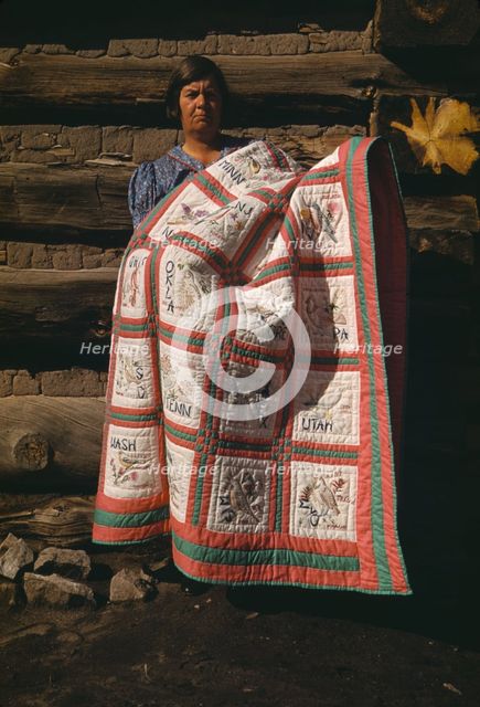 Mrs. Bill Stagg with state quilt which she made, Pie Town, New Mexico, 1940. Creator: Russell Lee.