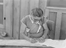 Mrs. Cates signs chattel mortgage with "X", Malheur County, Oregon, 1939. Creator: Dorothea Lange