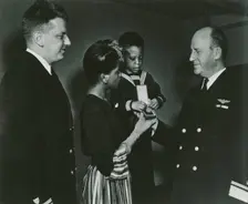 Mrs. Charles W. David, Jr.; African American widow and her three-year-old son, Neil..., 1939 - 1945. Creator: United States Coast Guard