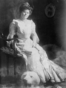Mrs. Chas. W. Fairbanks seated holding fan, 1910. Creator: Bain News Service