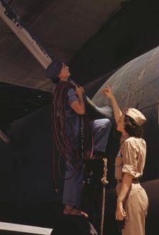 Mrs. Cora Ann Bowen (left) works as a cowler at the Naval Air Base..., Corpus Christi, Texas, 1942. Creator: Howard Hollem