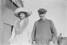 Mrs. Craig Biddle and J.A. Armstrong walking together, 1910. Creator: Bain News Service