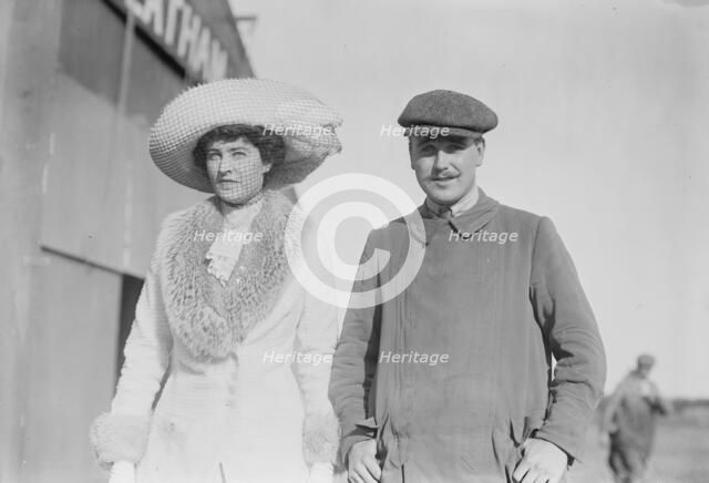 Mrs. Craig Biddle and J.A. Armstrong walking together, 1910. Creator: Bain News Service.